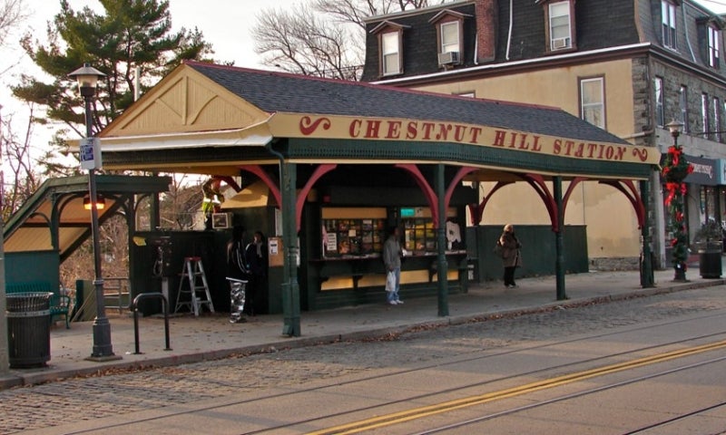 A train station that reads, "Chestnut Hill Station."